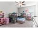 Charming bedroom with a bunk bed, desk, and plenty of storage at 1911 Fan Aloe Way, Ruskin, FL 33570