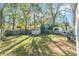 Large backyard with shed and mature trees at 3109 E Ida St, Tampa, FL 33610