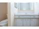 Clean bathroom with a vanity and a toilet at 332 Club Manor Dr # 10, Sun City Center, FL 33573