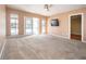 Living room with sliding doors to patio at 332 Club Manor Dr # 10, Sun City Center, FL 33573