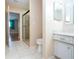 Bathroom with shower, toilet and vanity at 332 Club Manor Dr # 10, Sun City Center, FL 33573