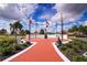 Brick pathway leads to a Veterans Memorial with flags and a statue at 332 Club Manor Dr # 10, Sun City Center, FL 33573