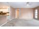 Bright living room features kitchen pass-through at 332 Club Manor Dr # 10, Sun City Center, FL 33573