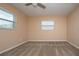 Spacious bedroom with neutral colored walls and carpet at 332 Club Manor Dr # 10, Sun City Center, FL 33573