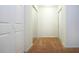 Bright entryway with mirrored closets and neutral carpeting at 332 Club Manor Dr # 10, Sun City Center, FL 33573