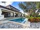 Stunning pool and patio area with water views at 3391 Maple Ne St, St Petersburg, FL 33704