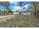 House exterior with carport and small yard at 4027 7Th S St, St Petersburg, FL 33705