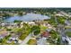 Aerial view of the neighborhood, home, and nearby waterfront at 8950 3Rd N St, St Petersburg, FL 33702