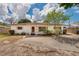 Charming single-story home with a well-manicured lawn and inviting curb appeal at 8950 3Rd N St, St Petersburg, FL 33702