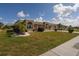 Ranch home with landscaped lawn and driveway at 1529 Allegheny Dr, Sun City Center, FL 33573