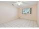 Bright bedroom featuring tiled floors and ceiling fan at 11200 102Nd Ave # 136, Seminole, FL 33778