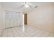 Bedroom with double door closet and ceiling fan at 11200 102Nd Ave # 136, Seminole, FL 33778