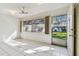 Bright living room with tiled floors and access to the backyard at 11200 102Nd Ave # 136, Seminole, FL 33778