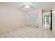 Bedroom with double door closet and access to hallway at 11200 102Nd Ave # 136, Seminole, FL 33778