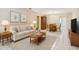 Cozy living room featuring neutral colors, a dining table, and tile flooring at 11200 102Nd Ave # 136, Seminole, FL 33778