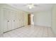 Bright bedroom with tiled floors and built-in closet at 11200 102Nd Ave # 136, Seminole, FL 33778