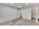 Well-lit bedroom with carpet, ceiling fan, and closet at 2113 E Del Webb Blvd, Sun City Center, FL 33573