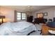 Well-lit bedroom with a comfortable bed and plenty of storage at 3006 Bolt Dr, Palm Harbor, FL 34685