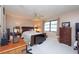 Cozy bedroom with a comfortable bed, a work desk, and ample closet space at 3006 Bolt Dr, Palm Harbor, FL 34685