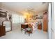 Charming bedroom featuring a floral bedspread and vintage furniture at 3006 Bolt Dr, Palm Harbor, FL 34685