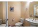 Clean and updated secondary bathroom with a pedestal sink and toilet at 400 4Th S Ave # 508, St Petersburg, FL 33701