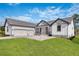 Stunning two-story home with three-car garage and landscaped yard at 4047 Southern Valley Loop, Brooksville, FL 34601