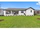 Charming home with covered patio and spacious backyard at 4047 Southern Valley Loop, Brooksville, FL 34601