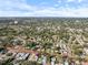 Charming home nestled in a peaceful neighborhood, featuring a serene landscape under a bright, cloud-dappled sky at 500 53Rd S St, St Petersburg, FL 33707