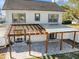 Exterior view of back of house showing spacious patio with wooden pergola at 500 53Rd S St, St Petersburg, FL 33707