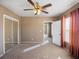 Comfortable bedroom features carpet flooring, a mirrored closet, and an ample closet at 500 53Rd S St, St Petersburg, FL 33707