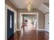 Entryway with hardwood floors and view into living room at 500 53Rd S St, St Petersburg, FL 33707