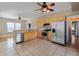 Spacious kitchen with stainless steel appliances and light wood cabinets at 500 53Rd S St, St Petersburg, FL 33707