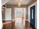 Living Room with hardwood floors and view into the kitchen at 500 53Rd S St, St Petersburg, FL 33707