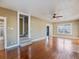 Inviting living room features beautiful hardwood floors and staircase to the second floor at 500 53Rd S St, St Petersburg, FL 33707