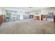 Renovation project: living room with fireplace and large windows at 5412 Pali Way, St Pete Beach, FL 33706