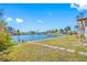 Waterfront lot with neighboring homes, lush landscaping at 5412 Pali Way, St Pete Beach, FL 33706