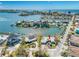 Aerial view of a waterfront property with neighboring houses at 5412 Pali Way, St Pete Beach, FL 33706