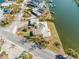 Aerial view of waterfront property with damaged home at 5412 Pali Way, St Pete Beach, FL 33706