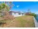 House exterior view, showing damage and need for renovation at 5412 Pali Way, St Pete Beach, FL 33706