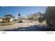 Quiet residential street with palm trees and homes at 8525 42Nd N Ave, St Petersburg, FL 33709