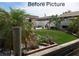 Landscaped backyard featuring artificial turf, tropical plants and a canal view at 8525 42Nd N Ave, St Petersburg, FL 33709