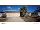 Single-story home with attached garage and landscaping at 8525 42Nd N Ave, St Petersburg, FL 33709