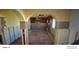 Kitchen with brick accents and wood floors, undergoing renovations at 8525 42Nd N Ave, St Petersburg, FL 33709