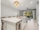 Modern kitchen with stainless steel appliances and an island at 8607 Canyon Creek Trl, Parrish, FL 34219