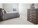 Cozy bedroom with ample closet space and window at 8607 Canyon Creek Trl, Parrish, FL 34219