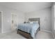 Comfortable bedroom with a double bed and access to a bathroom at 8607 Canyon Creek Trl, Parrish, FL 34219