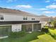 Ground-level home with a screened patio and grassy backyard at 8607 Canyon Creek Trl, Parrish, FL 34219