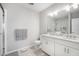 Clean bathroom with double vanity and walk-in shower at 8607 Canyon Creek Trl, Parrish, FL 34219