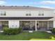 Back exterior view of a home with a large screened patio at 8607 Canyon Creek Trl, Parrish, FL 34219