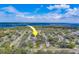 Aerial view of a residential neighborhood near the water at 140 Meadowlark Dr, Safety Harbor, FL 34695
